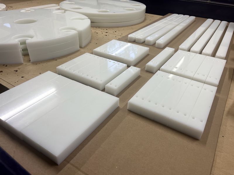 White HDPE plates and strips cut on the CNC router