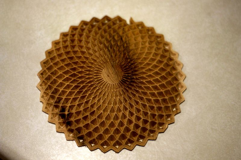 Sunburst rosette carving