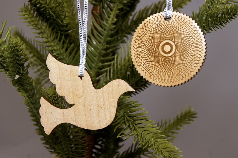 Laser-cut dove ornaments on the tree
