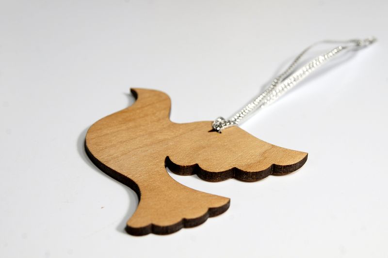 Laser-cut wooden dove
