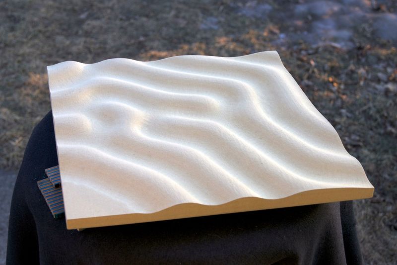 3-D wave plywood, a library wall sample