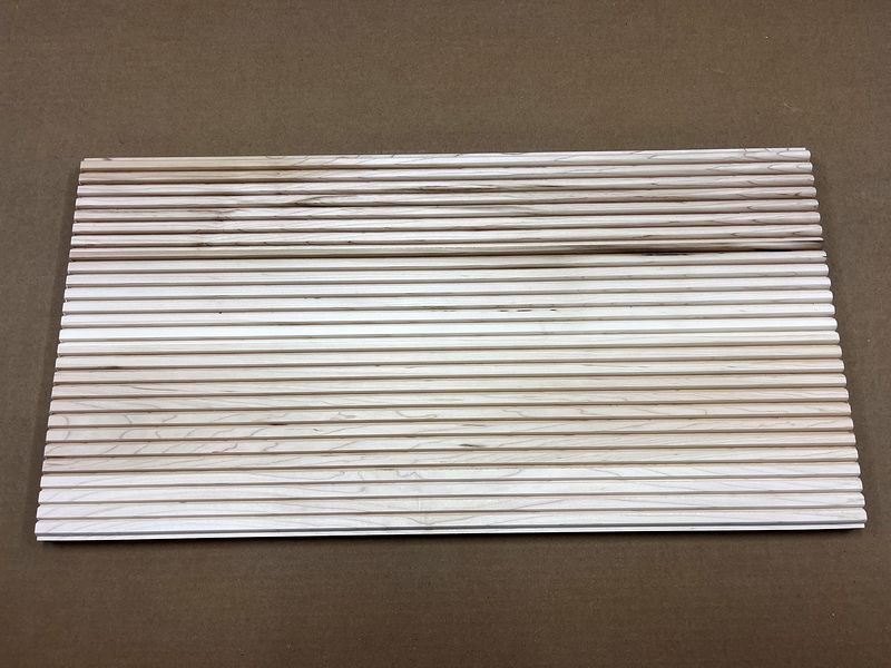 Beaded wooden cabinet panel