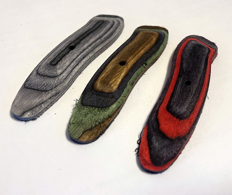 Three-color laminated bow grips for Gearhead Archery