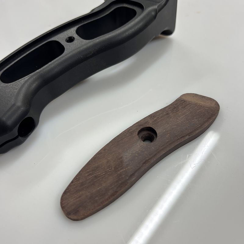 Bow grip handle with the hardwood insert out