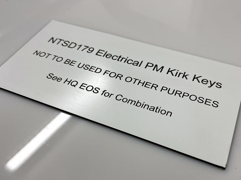 Engraved two-color Kirk key tag