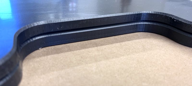 Close-up of a chamfered edge on black HDPE