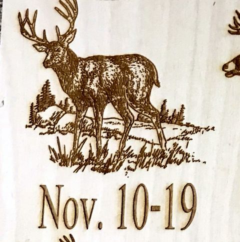 Laser-engraved deer plaque with the date