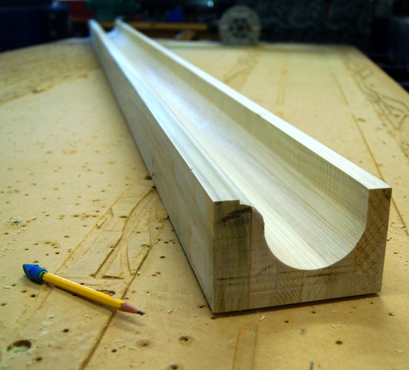 Long half-round concrete form on the CNC router bed